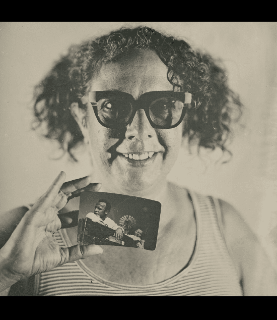Stacy Waldman holding Kodachrome snapshot; tintype